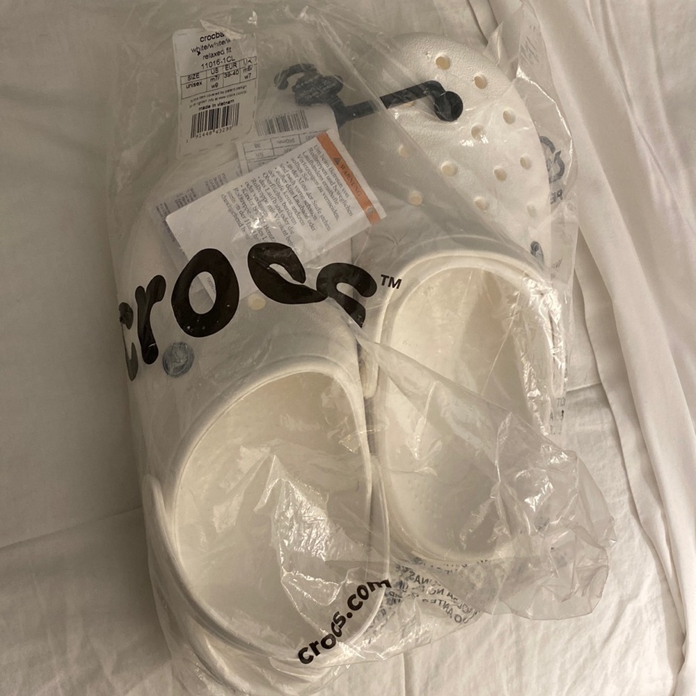 Brand new crocs size 7 MENS size 9 WOMENS